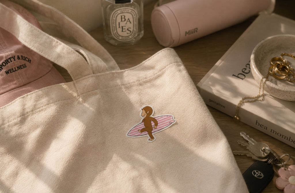 Surfing Curious George Sticker