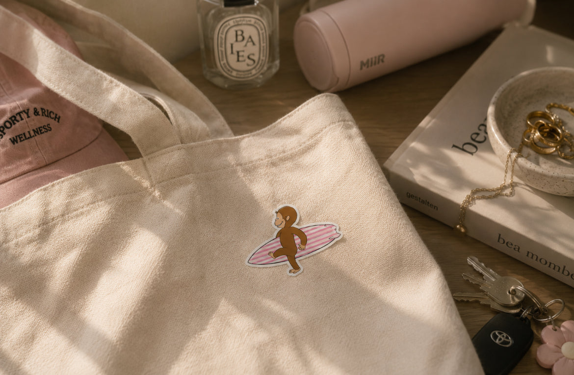 Surfing Curious George Sticker