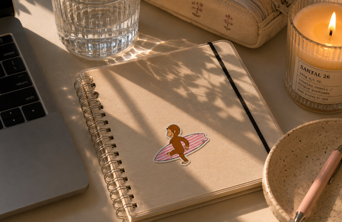 Surfing Curious George Sticker