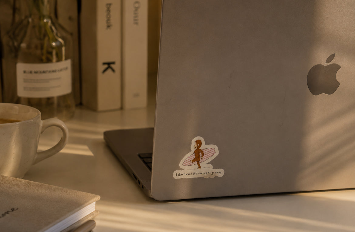 Surfing Curious George Sticker