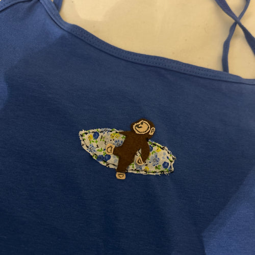 Blue tank with Curious George surf patch